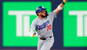 Miguel Rojas dio el jonrón que empató y provocó la victoria de Dodgers en la Serie Mundial. (MLB.com)