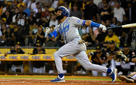 Emilio Bonifacio bateó su 1er jonrón para darle la victoria al Licey. (Cortesía)